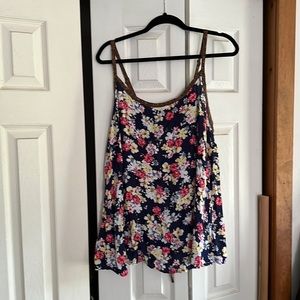 Torrid size 1 rayon tank top, blue w/ floral. Back has criscross material